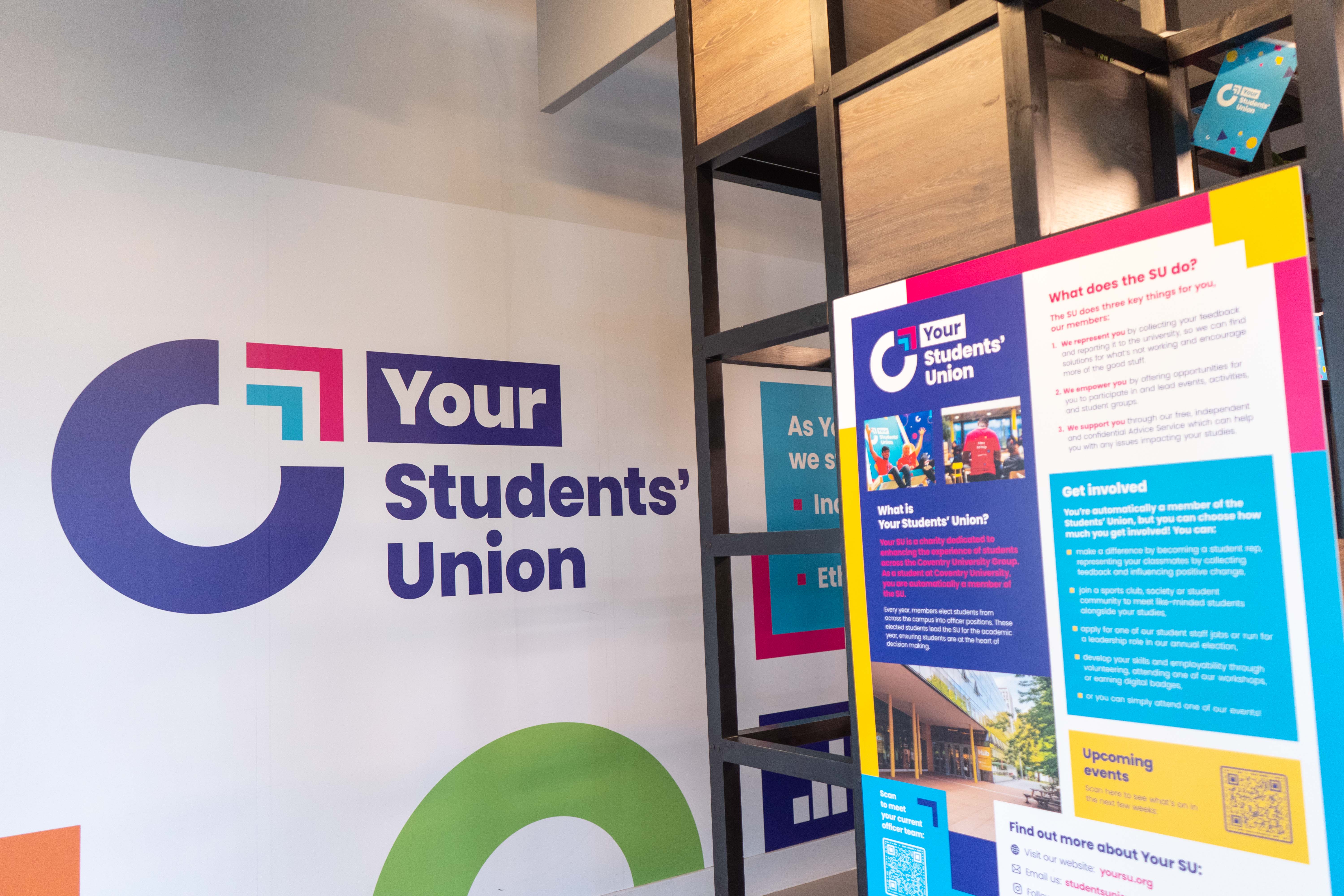 Your Students' Union logo displayed on a wall.