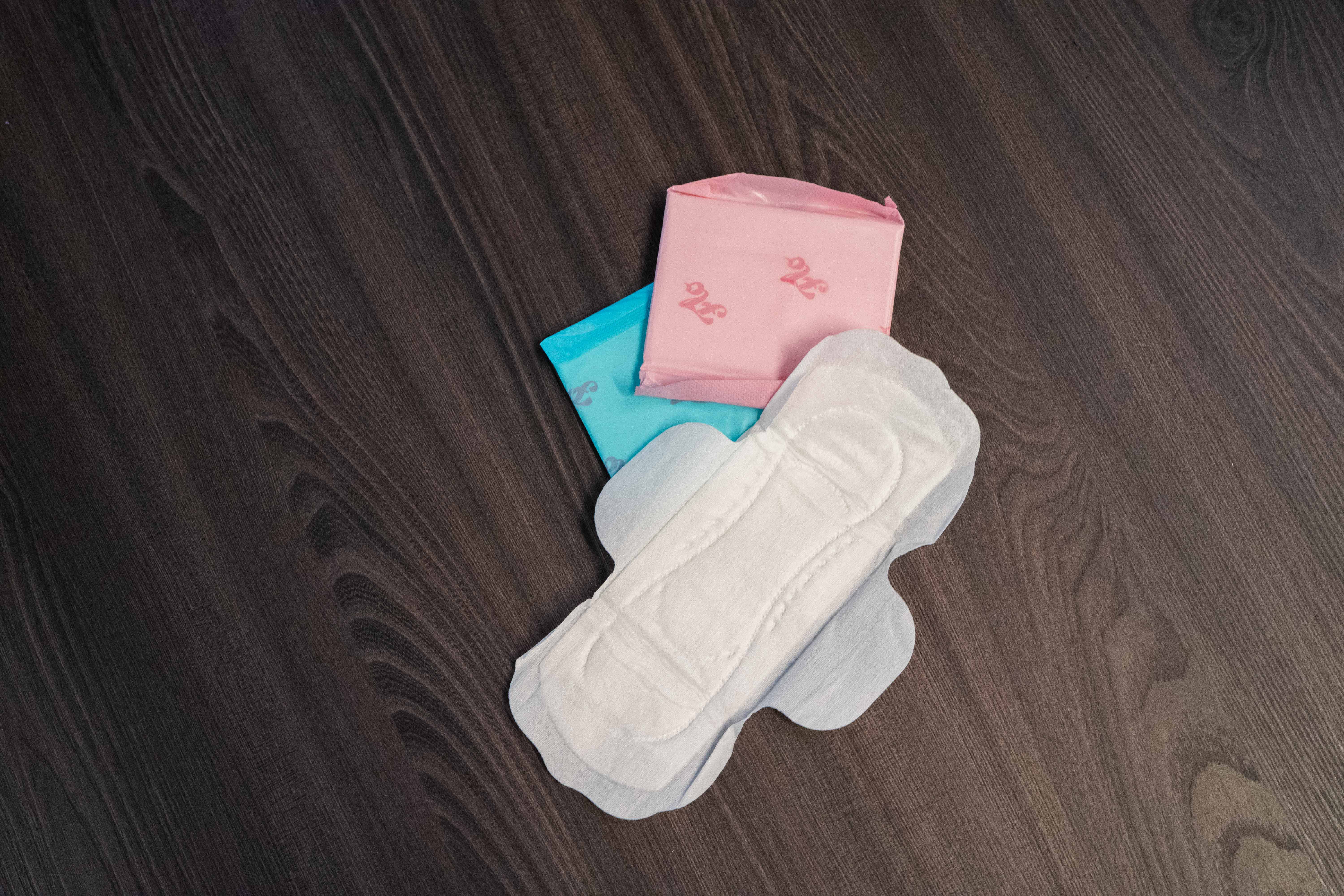 A selection of period products lay on a table.