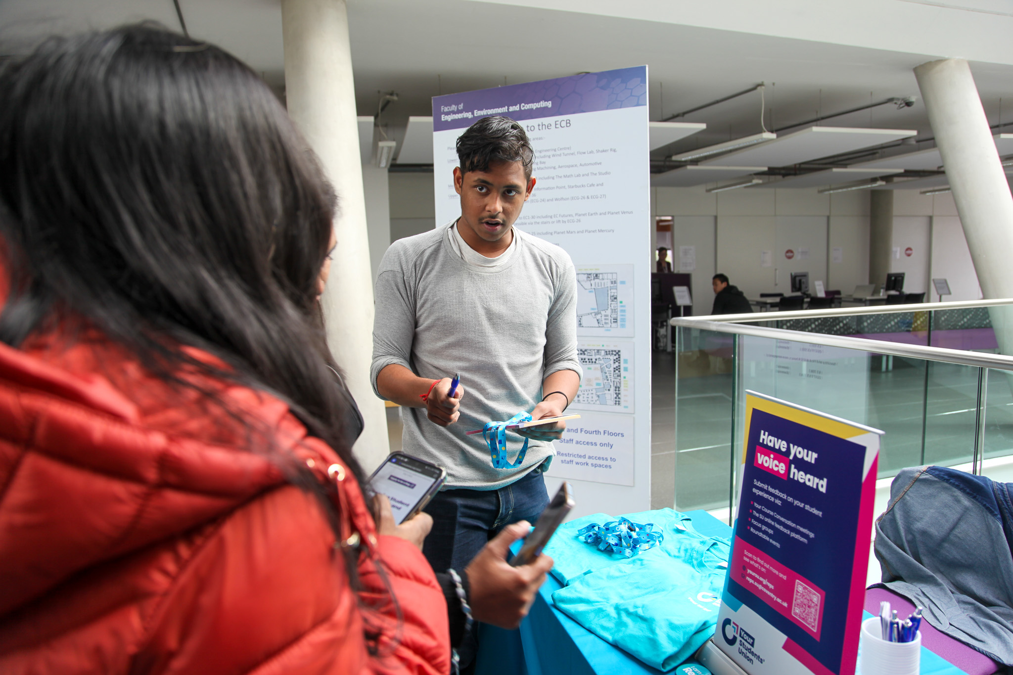 Two people engaging in a conversation.