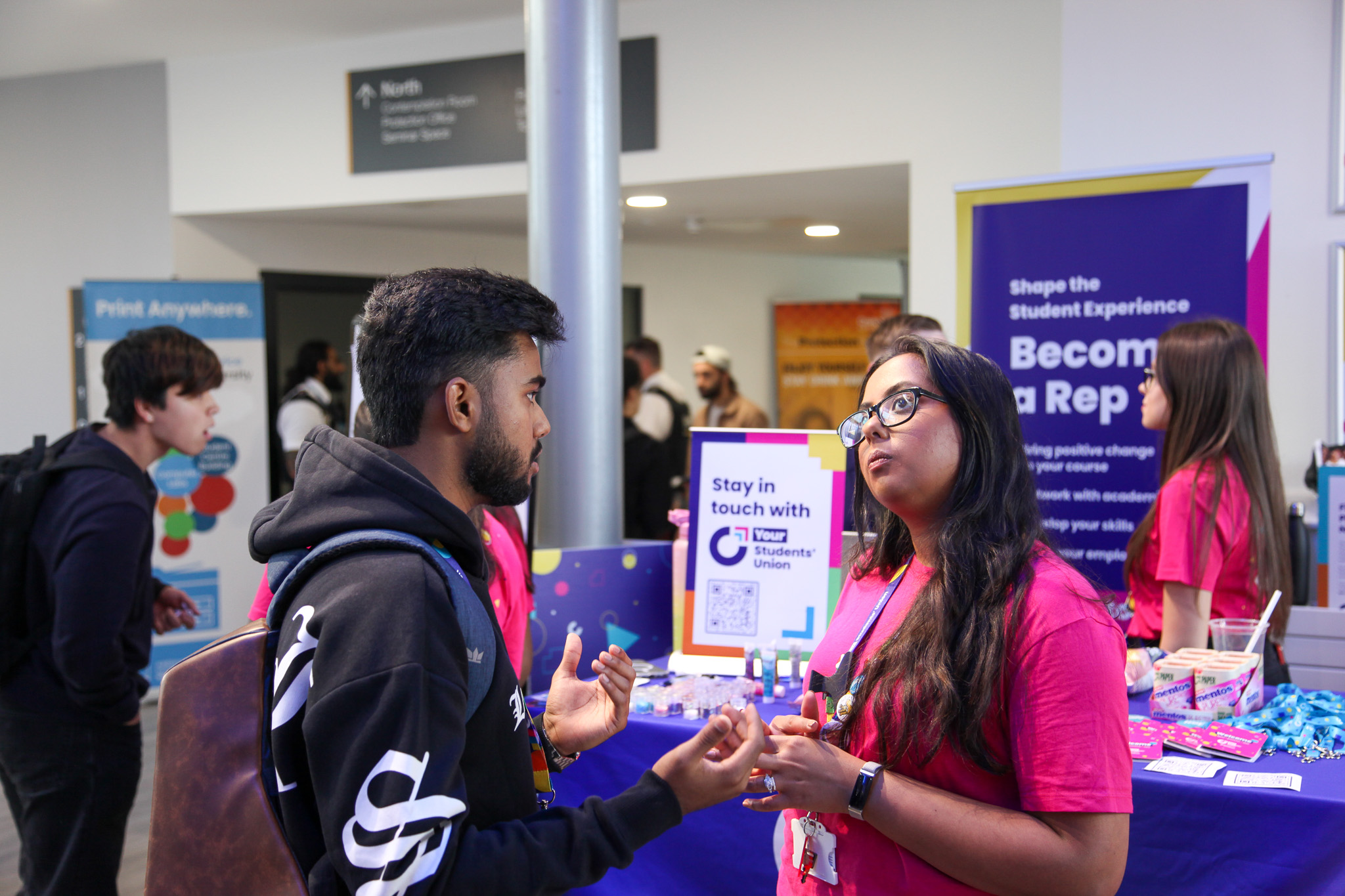 Two people engaging in a conversation.